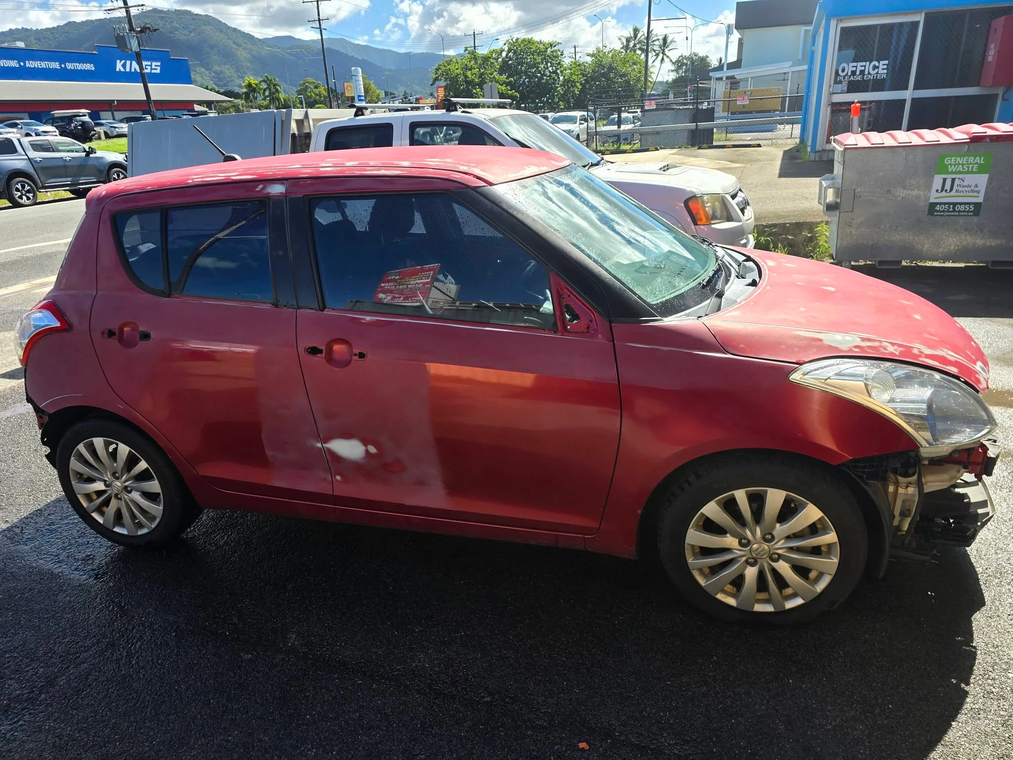 Front-end accident damage assessed for insurance claim Cairns